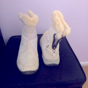 Back zipper. White Nortface boots.  Gently used